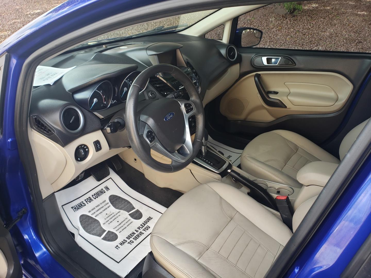 2014 /Tan and black Ford Fiesta Titanium (3FADP4FJ5EM) with an 1.6l i4 engine, 6-Speed Automatic transmission, located at 323 E Dunlap Ave., Phoenix, AZ, 85020, (602) 331-9000, 33.567677, -112.069000 - 2014 Ford Fiesta Titanium,.......A Must See!!... No accidents, Only 95K MILES.... Ice cold AC. The car is gorgeous inside and out. Power windows, Power door locks, Touch screen Stereo/ CD Player, Phone sync, Bluetooth, Satellite compatible, Backup camera, Beautiful tan and black interior with tan le - Photo#9
